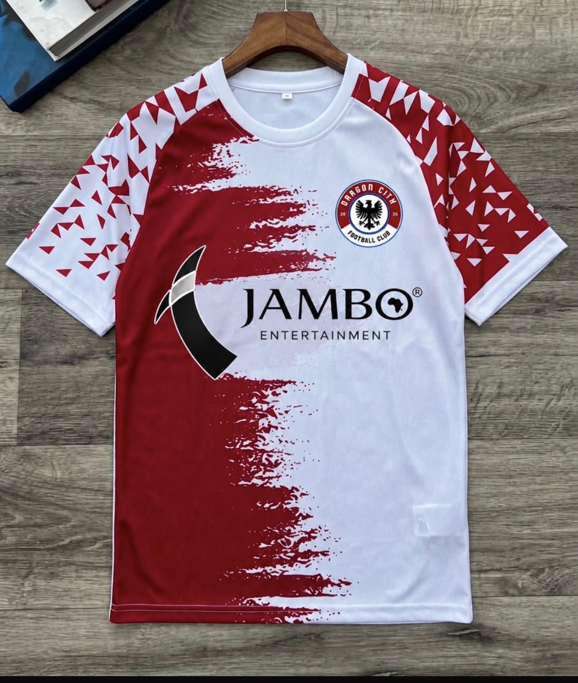 Dragon City FC home jersey with the correct circular eagle crest